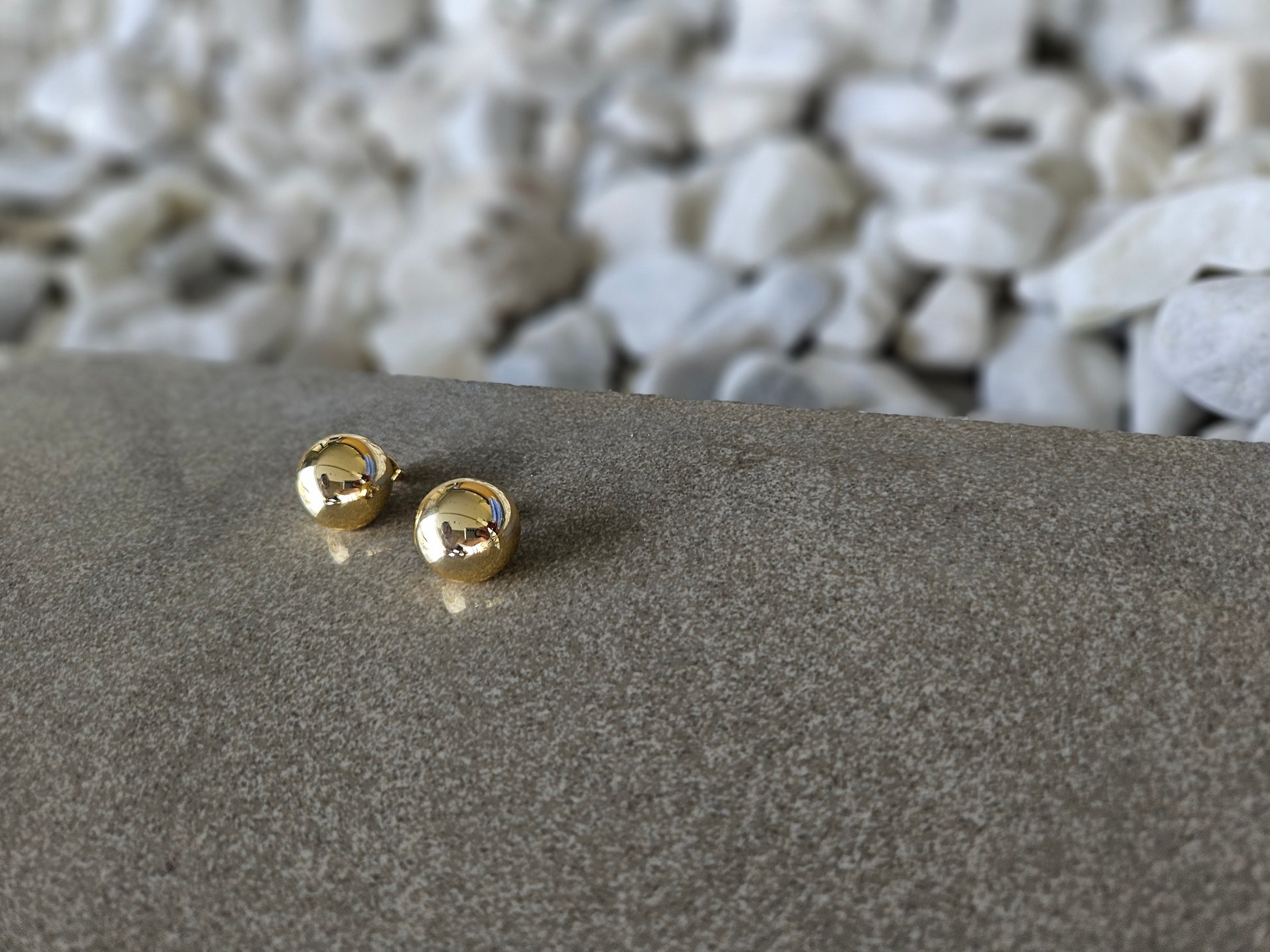 Geometric grace. These 18K gold-filled earrings are a modern interpretation of a classic shape.