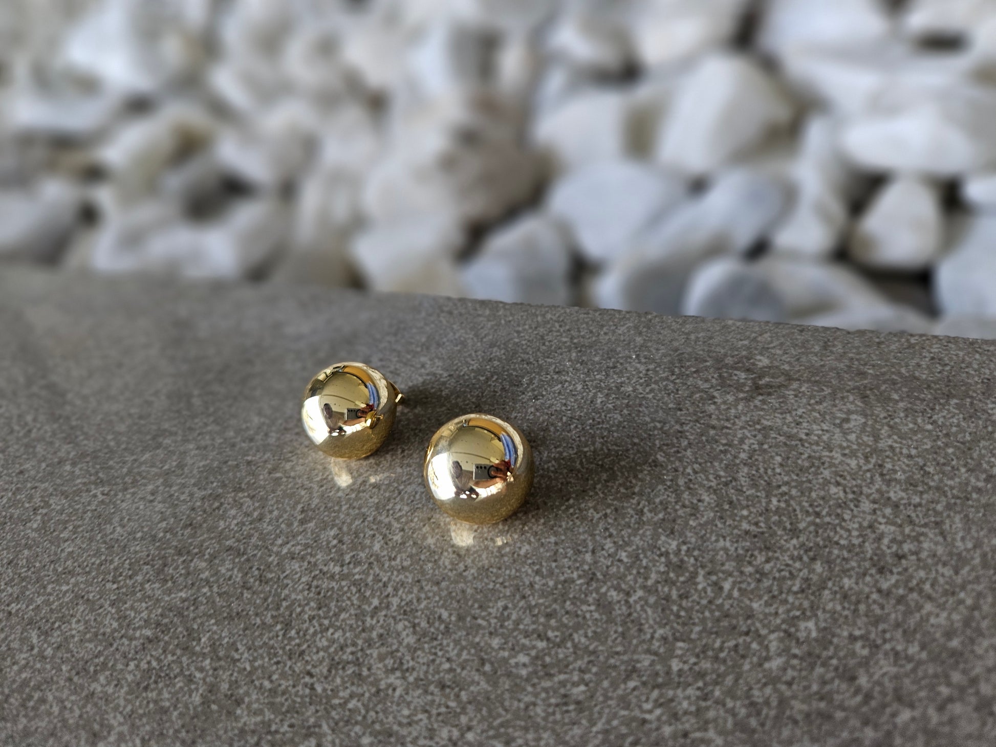Geometric grace. These 18K gold-filled earrings are a modern interpretation of a classic shape.