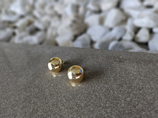 Geometric grace. These 18K gold-filled earrings are a modern interpretation of a classic shape.