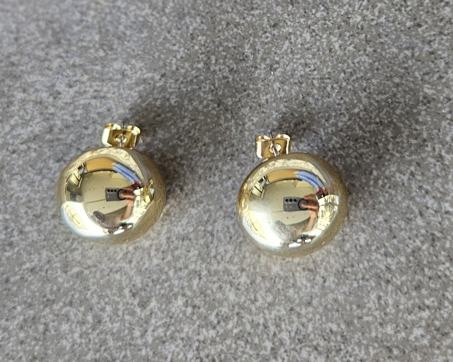 Geometric grace. These 18K gold-filled earrings are a modern interpretation of a classic shape.