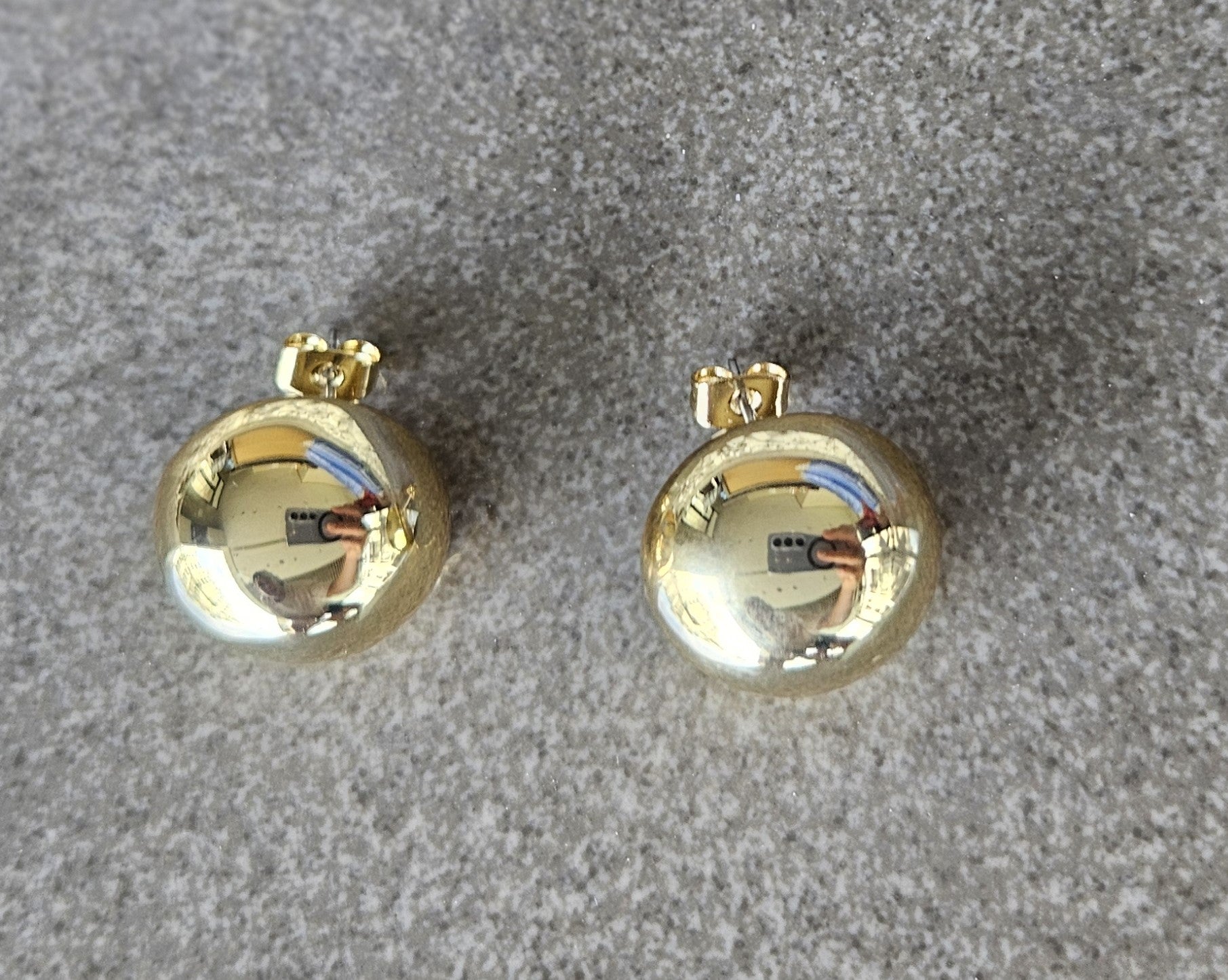 Geometric grace. These 18K gold-filled earrings are a modern interpretation of a classic shape.