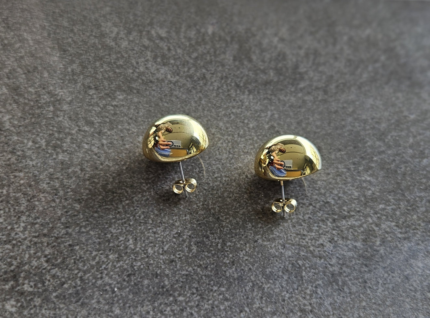 Geometric grace. These 18K gold-filled earrings are a modern interpretation of a classic shape.