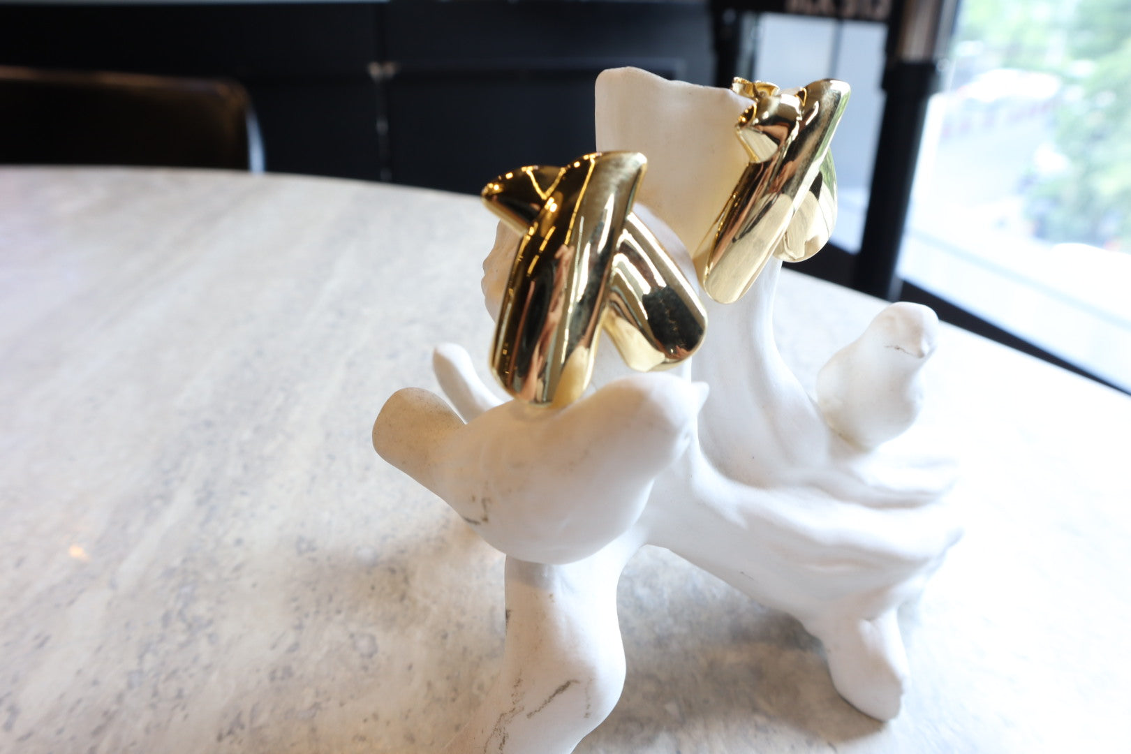 Intersect with style. Our 18K gold-filled X earrings are a bold and modern statement.