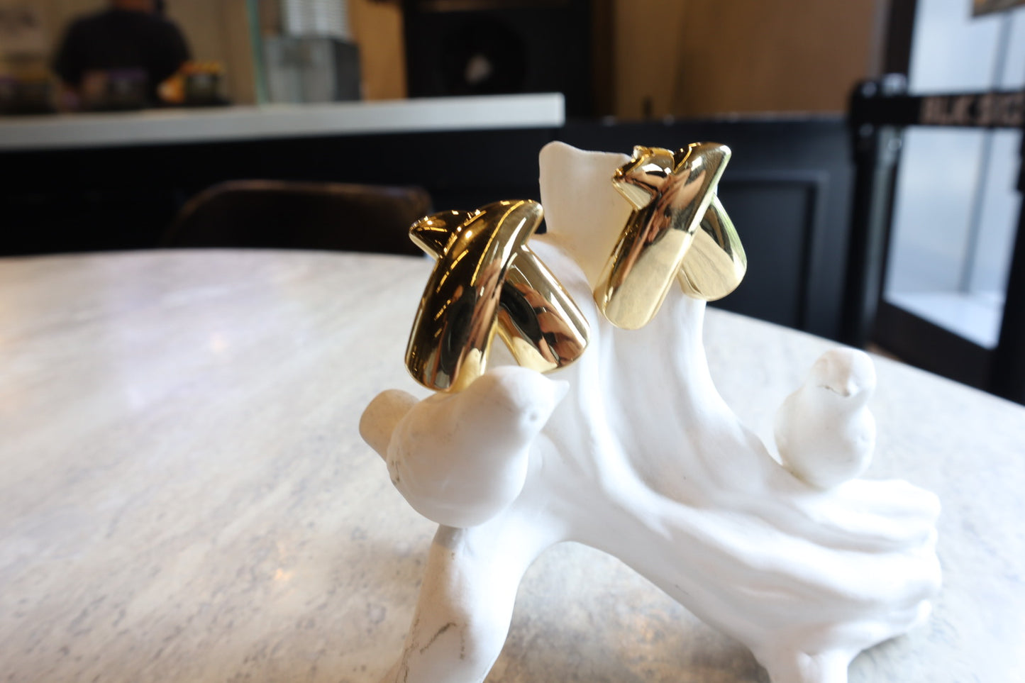 Intersect with style. Our 18K gold-filled X earrings are a bold and modern statement.