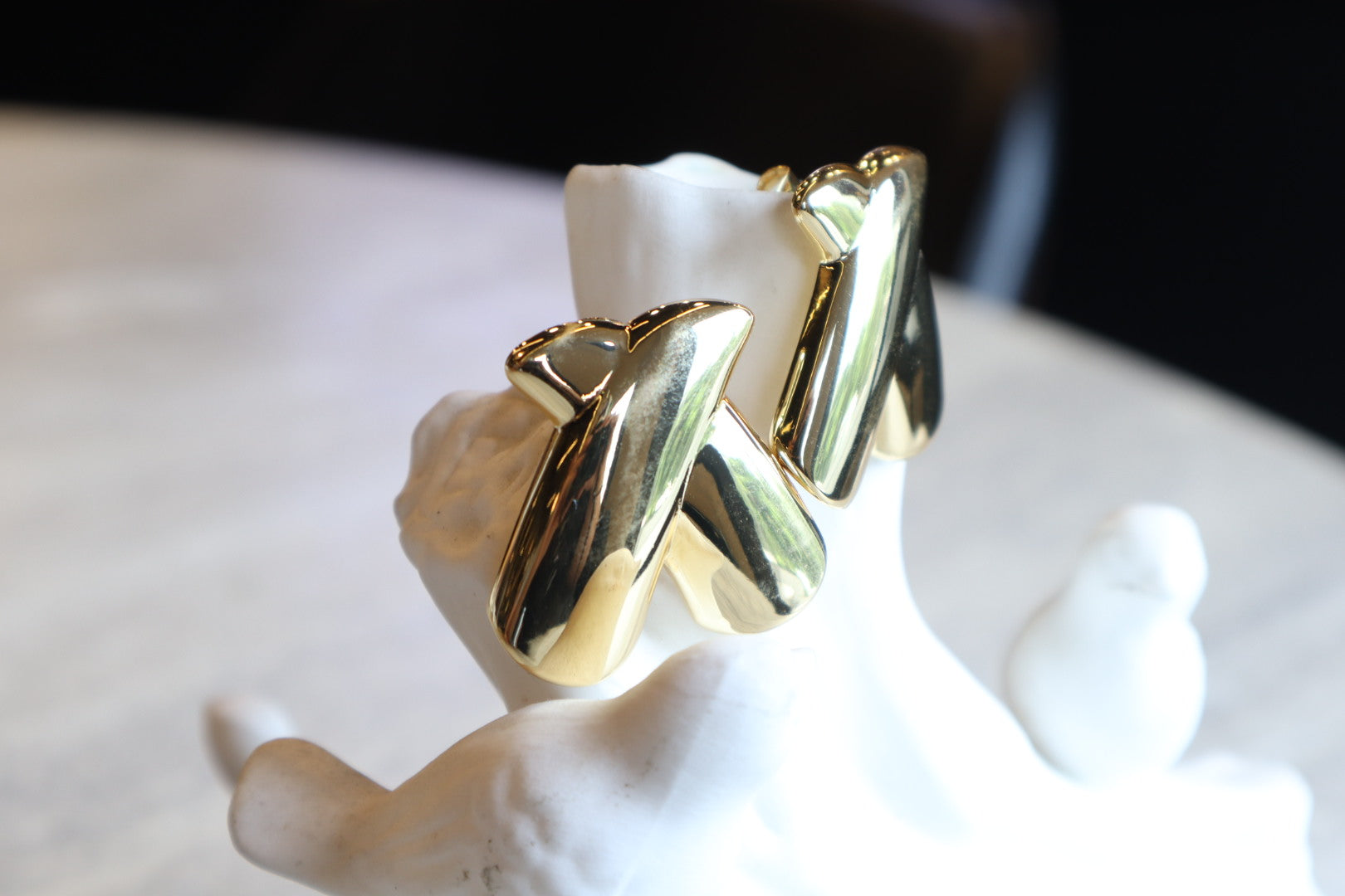 Intersect with style. Our 18K gold-filled X earrings are a bold and modern statement.