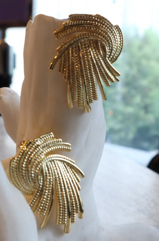 Whether you're dressing up or down, these 18K Gold Filled Retro Flair Earrings are the perfect finishing touch. The unique shape and luxurious material make them a versatile piece that can be styled in countless ways.