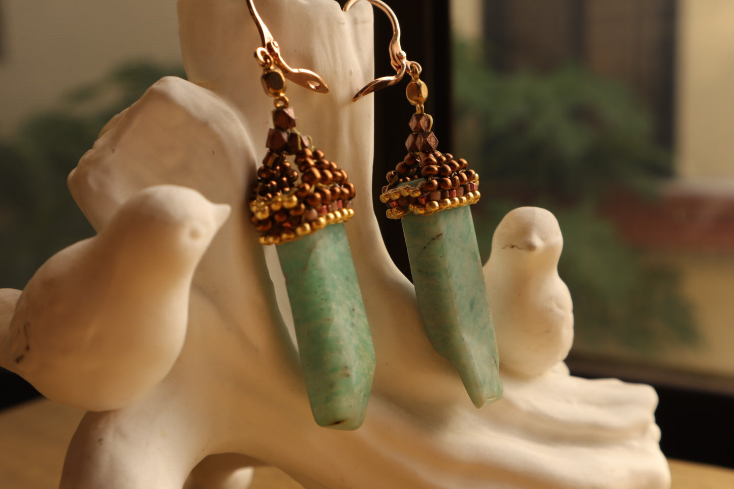 Stunning amazonite dagger beads cascade from a secure gold-filled rose French clasp, offering a touch of modern luxury for any occasion.