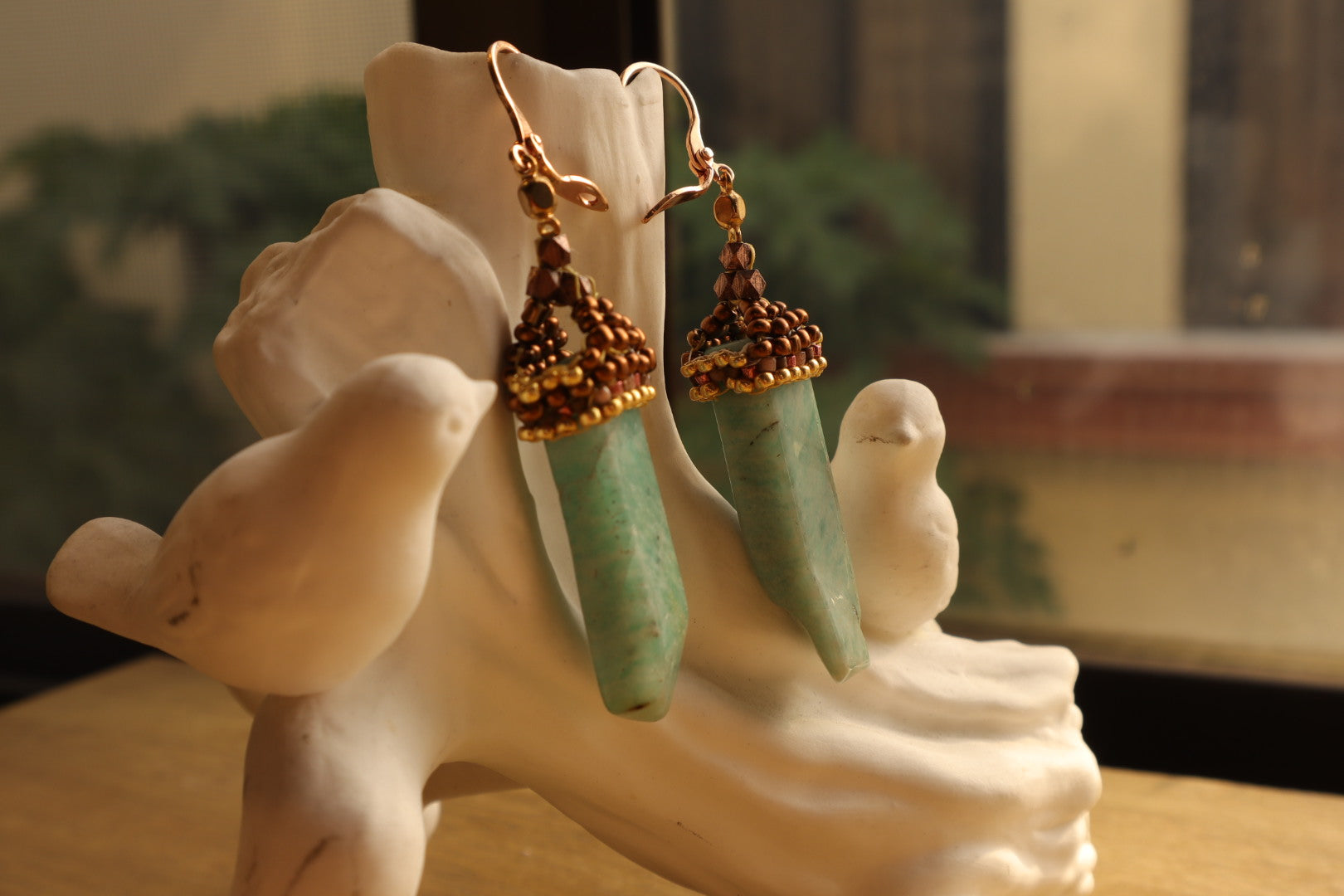 Stunning amazonite dagger beads cascade from a secure gold-filled rose French clasp, offering a touch of modern luxury for any occasion.