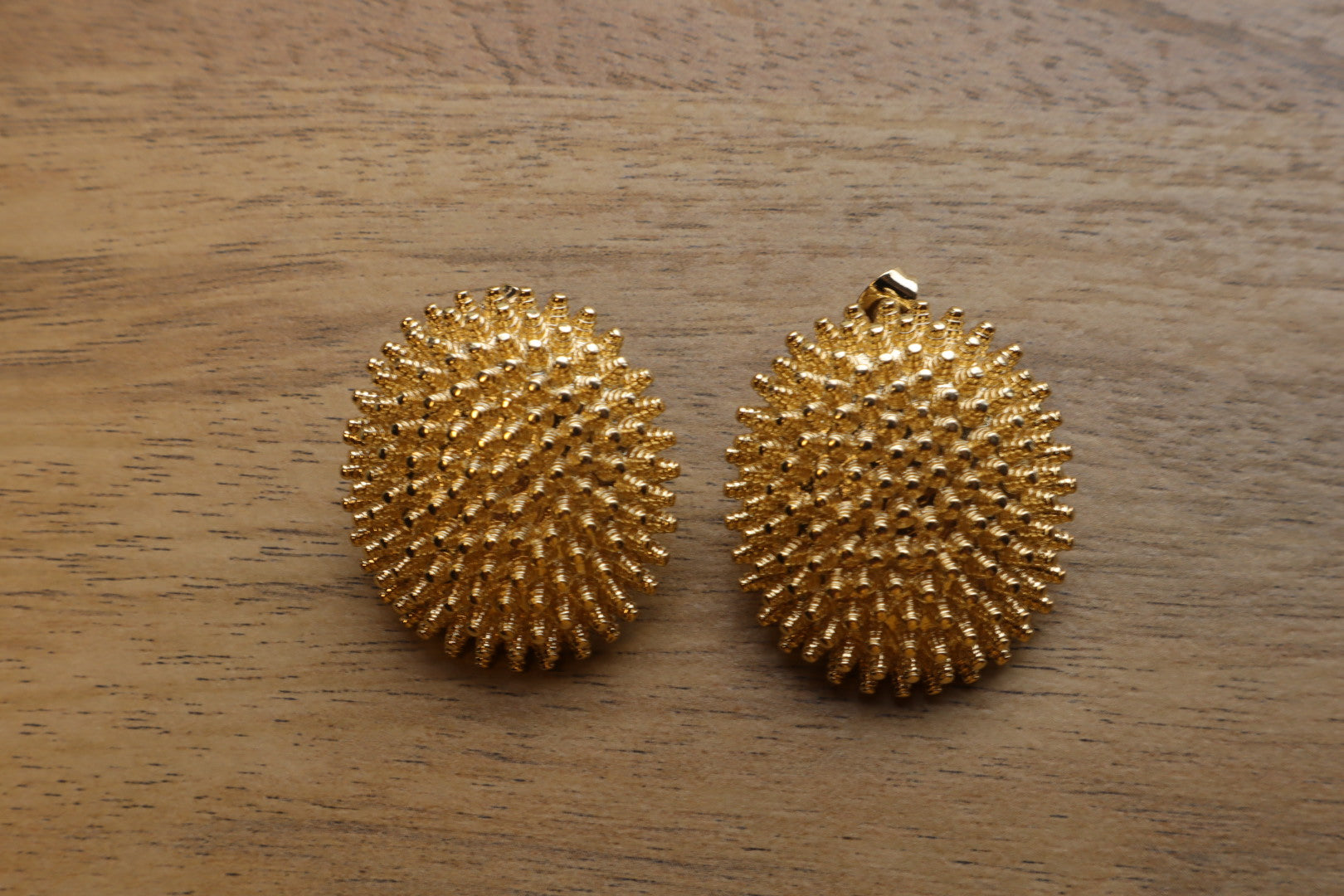 Unconventional elegance. Our 18K gold-filled hedgehog earrings are a playful yet sophisticated statement piece.