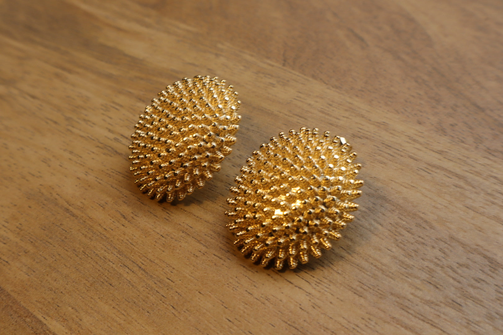Unconventional elegance. Our 18K gold-filled hedgehog earrings are a playful yet sophisticated statement piece.