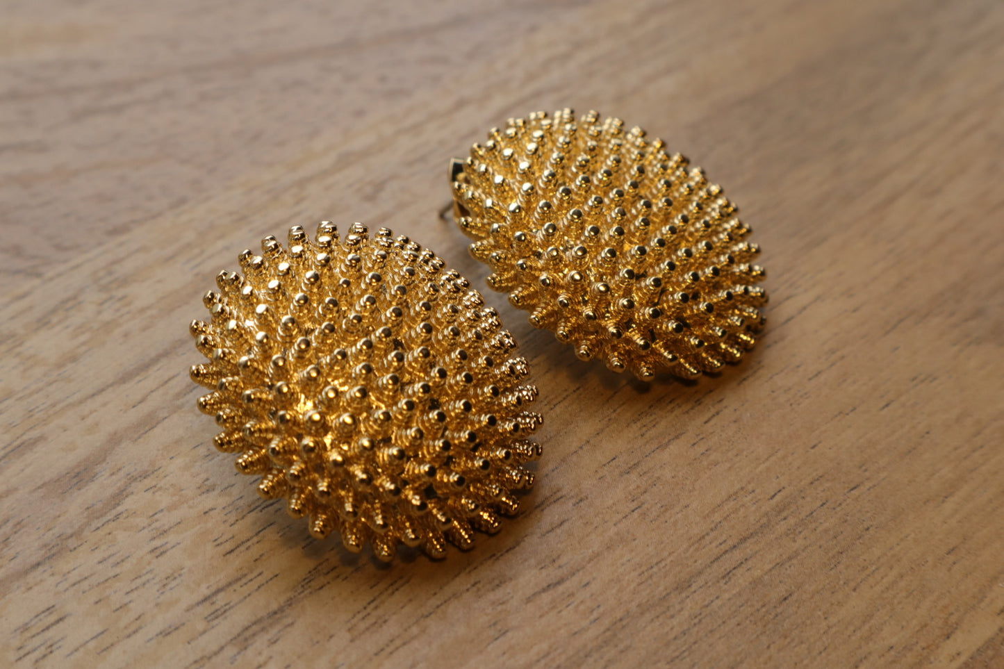 Unconventional elegance. Our 18K gold-filled hedgehog earrings are a playful yet sophisticated statement piece.