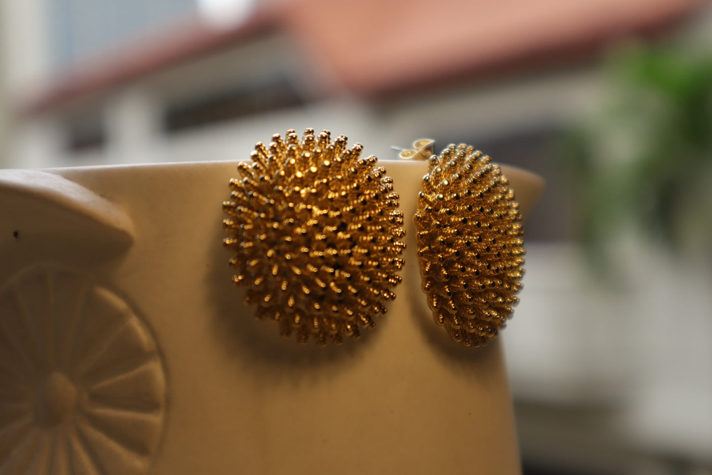 Unconventional elegance. Our 18K gold-filled hedgehog earrings are a playful yet sophisticated statement piece.
