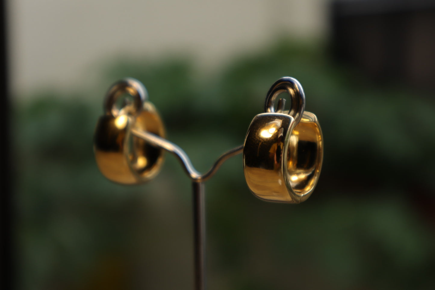 Minimalist luxury. Our 18K gold-filled small thick hoop earrings are the epitome of understated elegance.