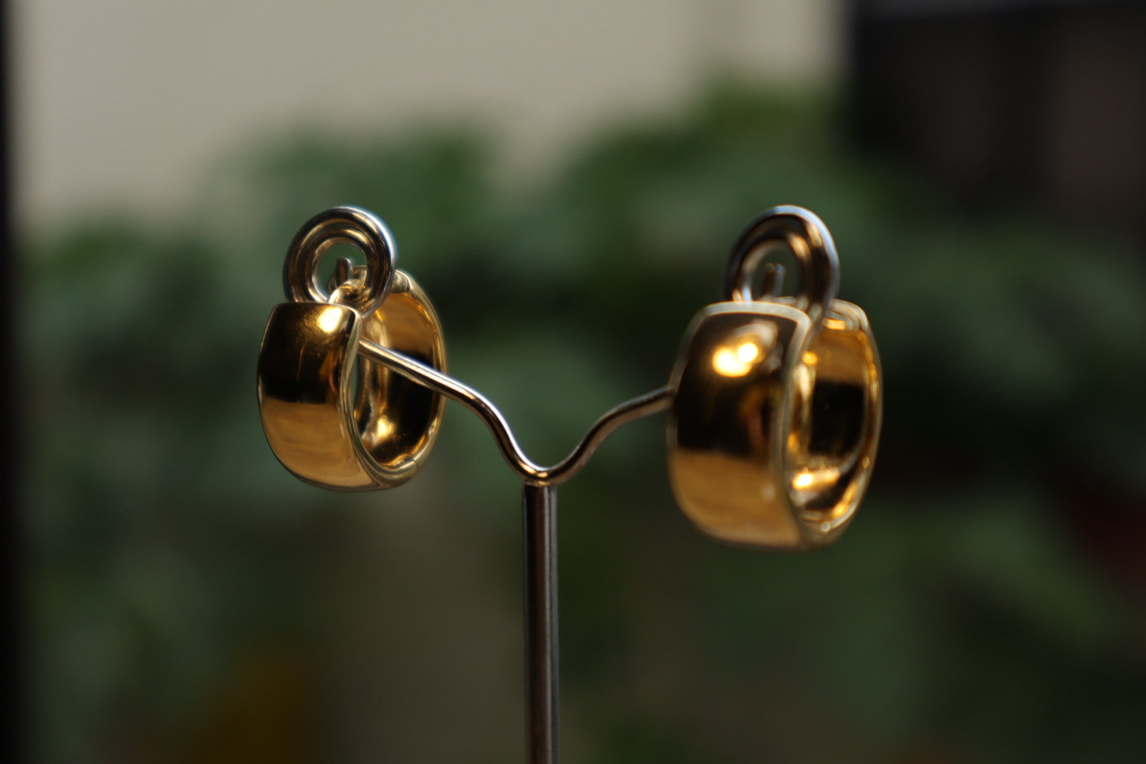 Minimalist luxury. Our 18K gold-filled small thick hoop earrings are the epitome of understated elegance.