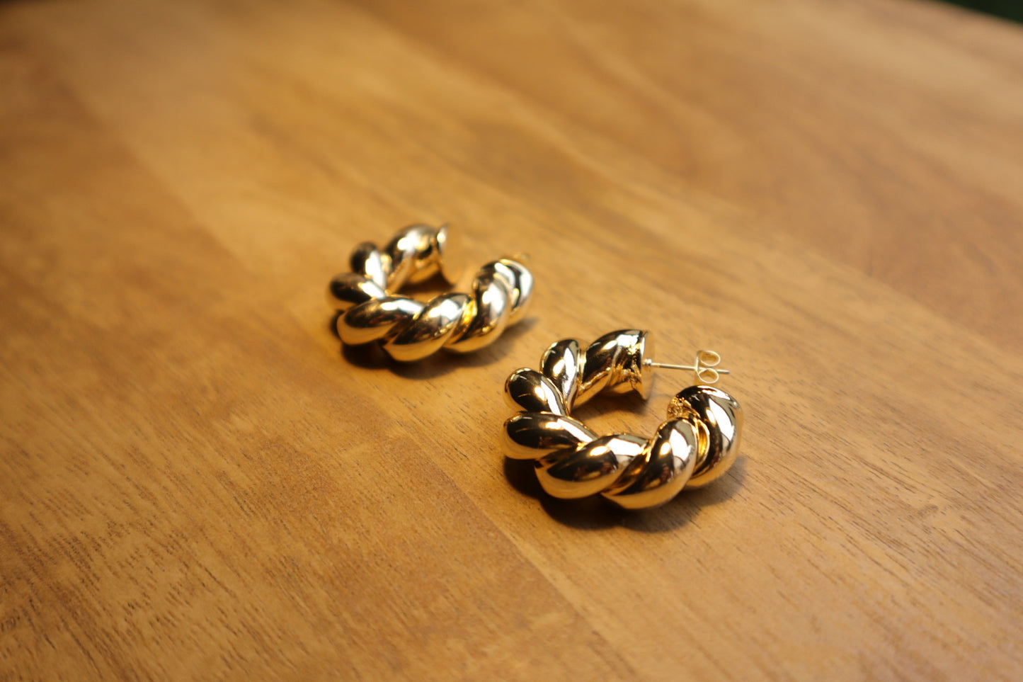 Intricate yet effortless. Discover the allure of our 18K gold-filled twisted hoop earrings.