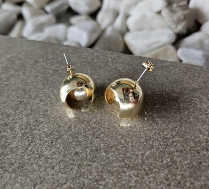 Playful elegance. Discover the charm of our 18K Gold Filled Ball in Ball Earrings.