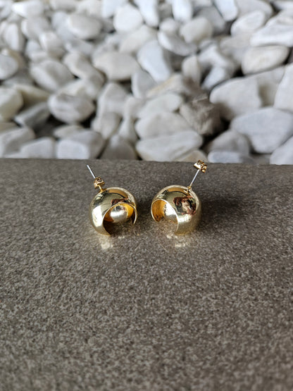 Playful elegance. Discover the charm of our 18K Gold Filled Ball in Ball Earrings.