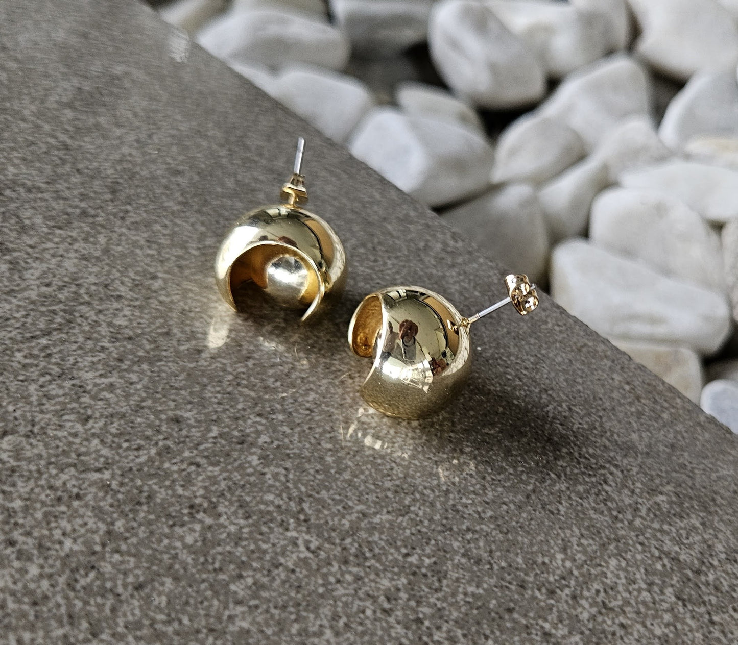 Playful elegance. Discover the charm of our 18K Gold Filled Ball in Ball Earrings.