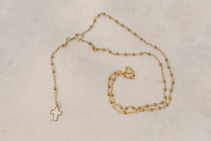 A touch of grace. 18k rose gold-filled rosary necklace with a beautiful mother-of-pearl cross.