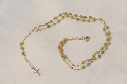 A pixie's prayer. Gold-filled rosary featuring petite turquoise beads for a touch of whimsical faith.